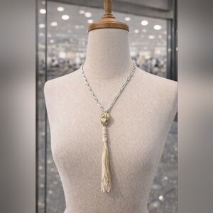 Gold necklace with knotted tassel